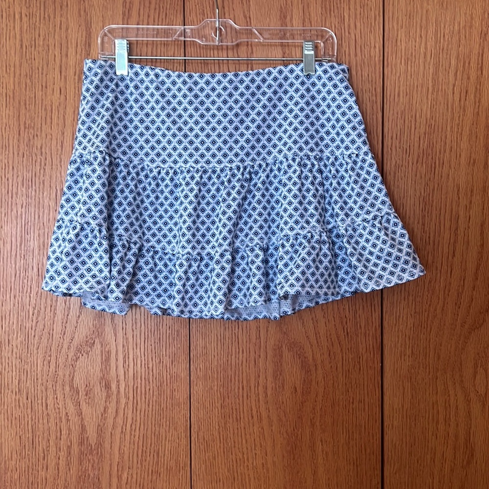 Lucky in Love tennis skirt size L (12) with interior shorts, white/blue pattern
